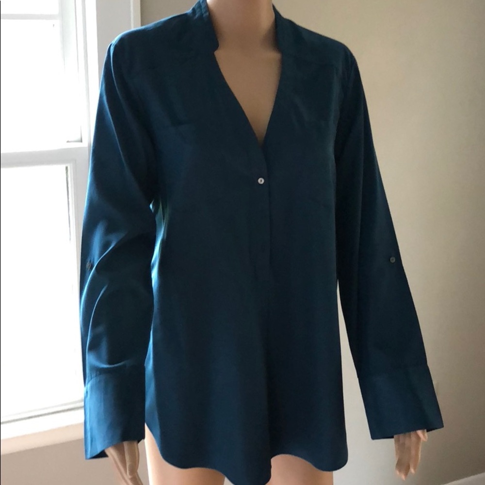 Teal blouse. Feels like silk but it’s not.